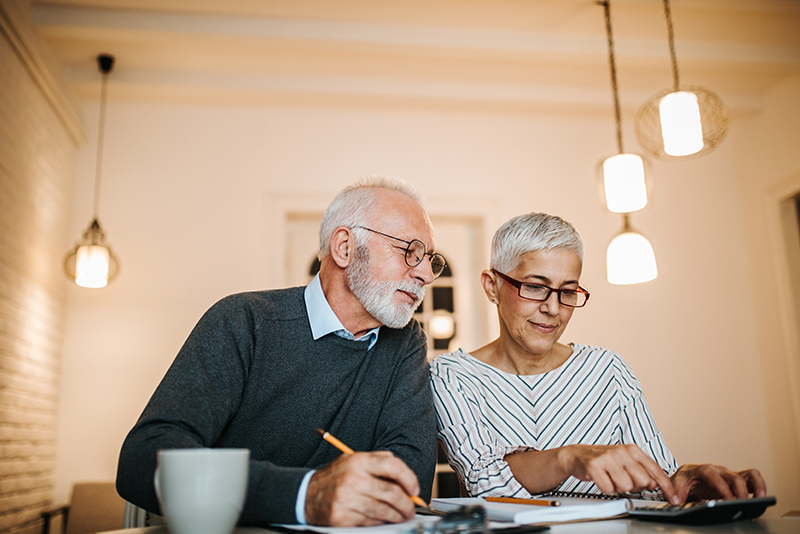 An older couple looking to save for retirement