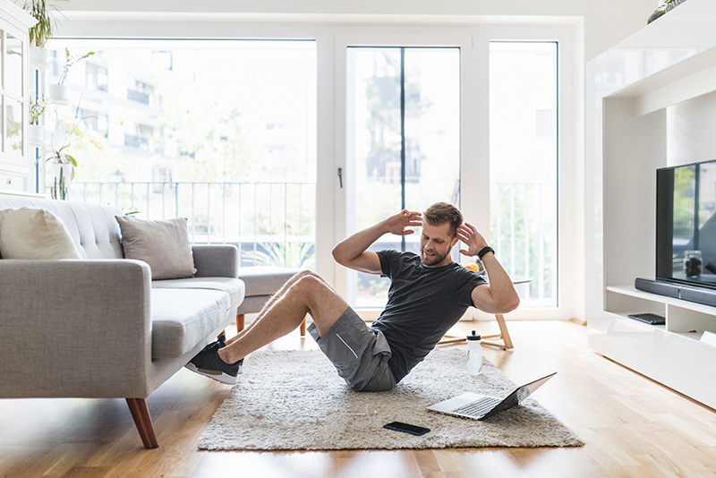 financial health, man doing ab workout