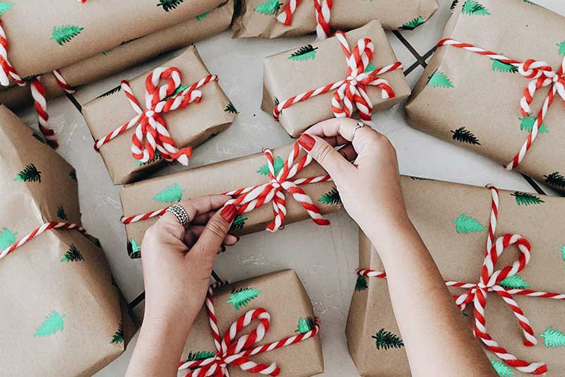 collection of gifts being wrapped—showing how you can still have great holiday gift ideas on a budget