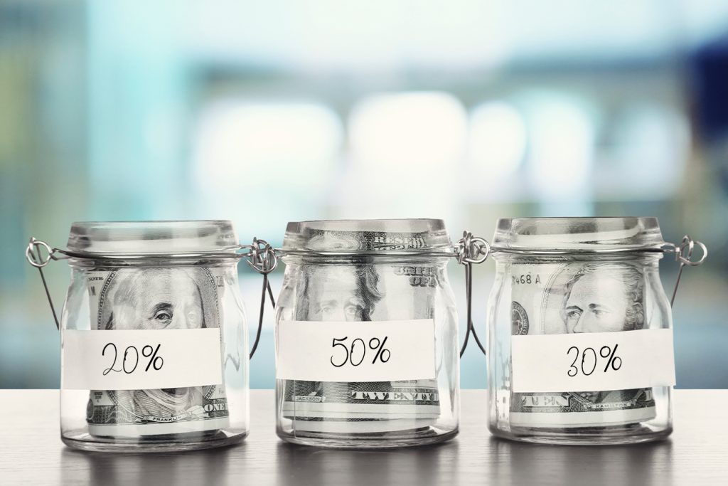 Money divided into jars, What is the 50 30 20 rule