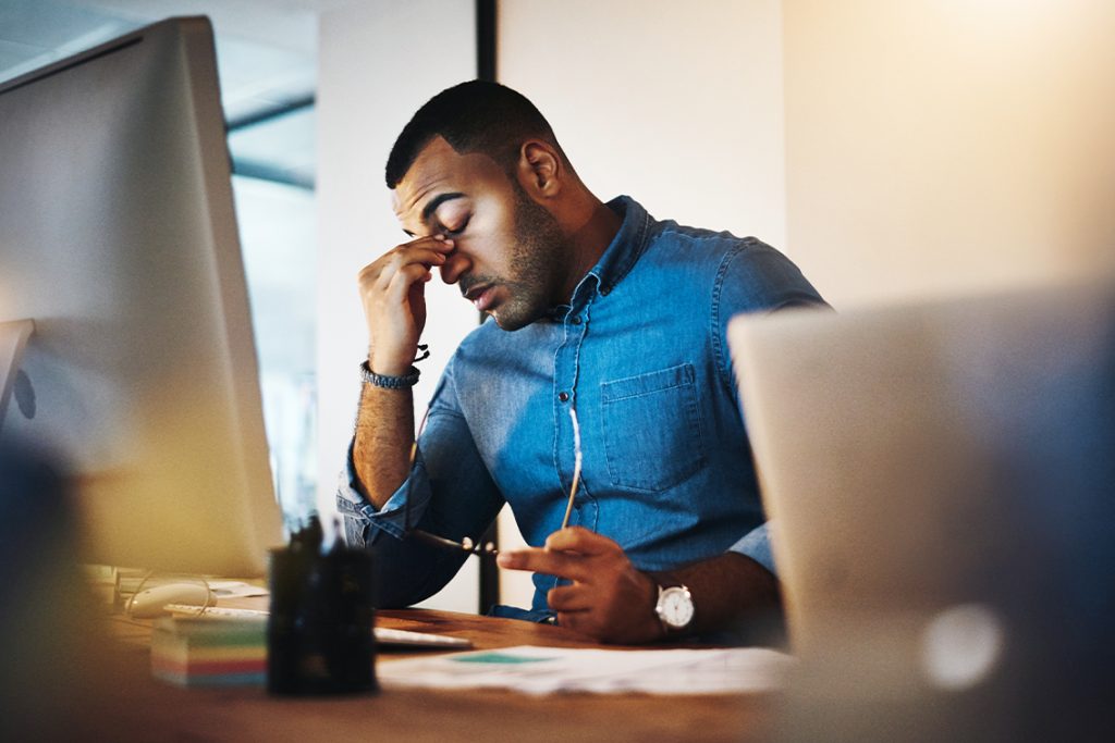 Man stressed out before he finds out about personal loan benefits