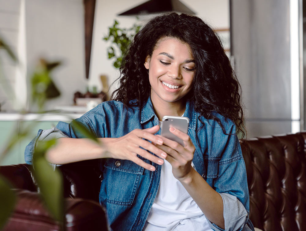 woman on phone looking at eStatements