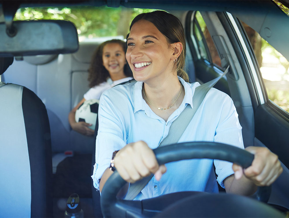 auto loans delaware, woman in car